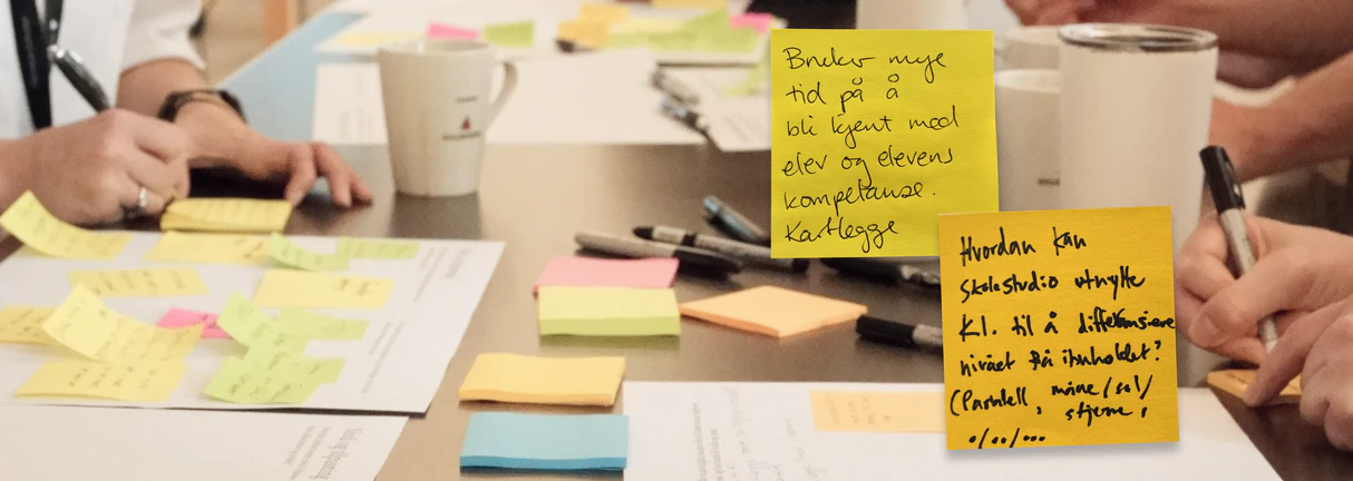 Workshop with teachers, sticky notes and handwritten input